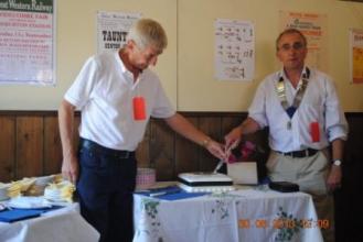 2013 handover Lion President Twiggy Lake cutting the cake